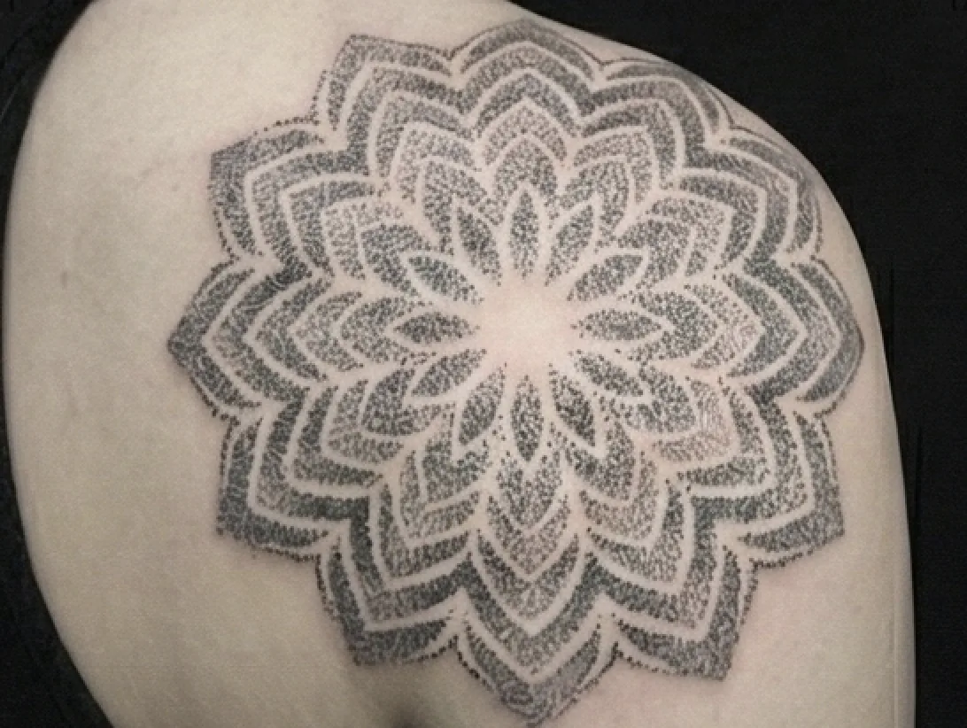 Dotwork tattoo concept with ornamental geometry